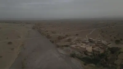 an aerial view of a village in the desert at Ouboumalne in Tamsahelt
