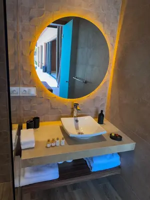 a bathroom with a sink and a mirror at Villa Rubis in Marrakech
