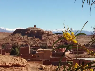 a view of a village in the desert at Riad Paradise of Silence in Aït Ben Haddou