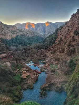 an aerial view of a river in a canyon at Welcome Hôtel Dijon in Ouzoud