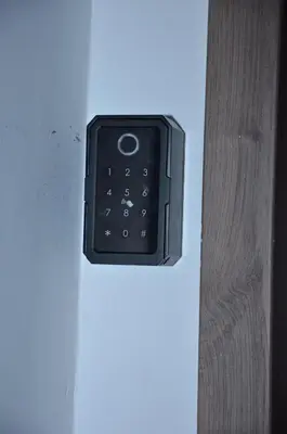 a remote control is attached to a wall at Miramar Prestigia in Ville Nouvelle