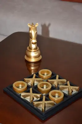 a gold trophy sitting on top of a table at Miramar Prestigia in Ville Nouvelle