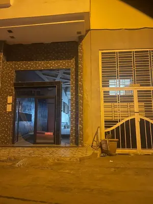 an entrance to a building with the door open at Modern apartment Hamria Meknes in Meknès