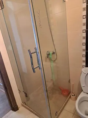 a shower stall in a bathroom with a toilet at Chalet Villa de Luxe - Piscine in Dchar Aït Belkassem
