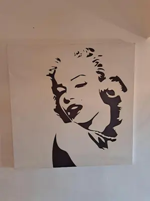 a drawing of a woman on a wall at Chalet Villa de Luxe - Piscine in Dchar Aït Belkassem