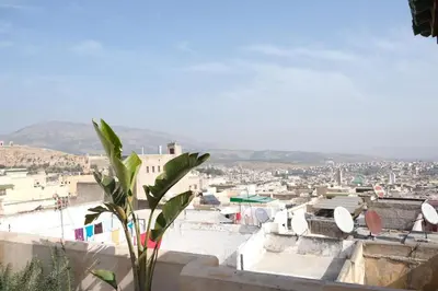 a view of a city from the roof of a building at Dar Fes Zahra in Fès