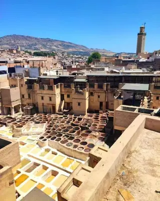 an aerial view of a city with buildings at Appartement Centre Ville - ATLAS 46 in Fès