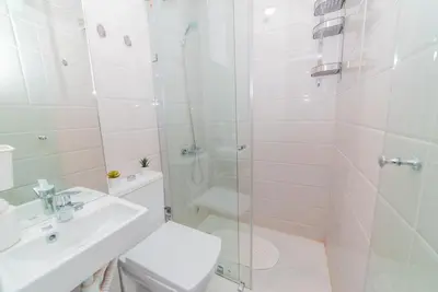 a bathroom with a shower and a toilet and a sink at Familiale, raffinement et calme, entourée d'une vue sur le jardin - À proximité de l'aéroport et de Marjane in Fès