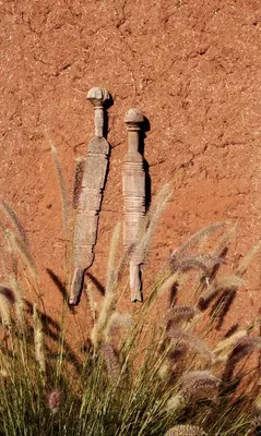 two faucets on the side of a wall at Dar Tasmayoun in Aït Ourir