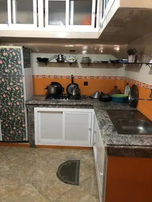a kitchen with a sink and a counter top at Mahmoud moulay Yacoub 1 in Moulay Yacoub