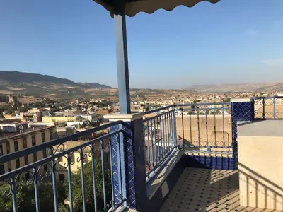 a balcony with a view of a city at Riad d'Art de Fès in Fès al Bali
