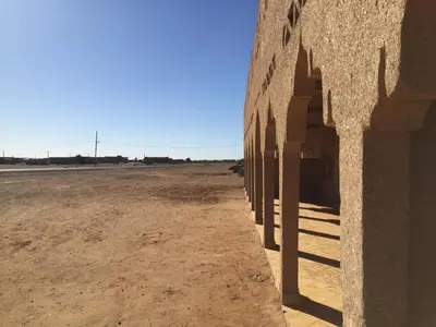 a side view of a building in the desert at Khamlia Desert Bed & Breakfast in Khamliya