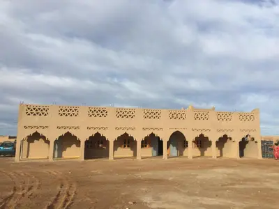 an old building in the middle of a desert at Khamlia Desert Bed & Breakfast in Khamliya