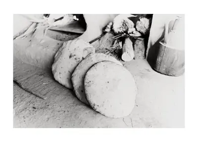 a black and white photo of bread and vegetables at Khamlia Desert Bed & Breakfast in Khamliya