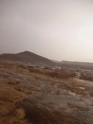 a view of a desert with a mountain in the background at Segaoui House in Merzane