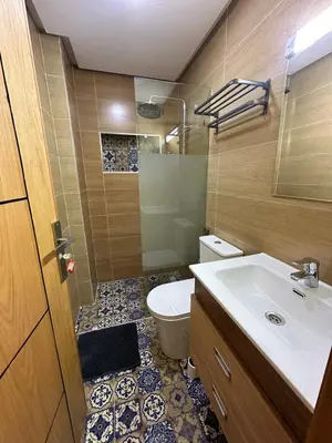 a bathroom with a toilet and a sink at appartement à fes in Fès