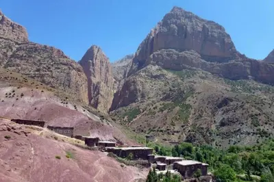 a view of a mountain with a village on a hill at Taghia Accommodation in Taghia