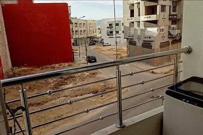 a balcony with a view of a city street at شقة بموقع جد مناسب فاس in Fès