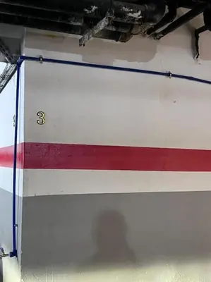 a red white and blue stripe on a boat at Ghali Appart in Fès