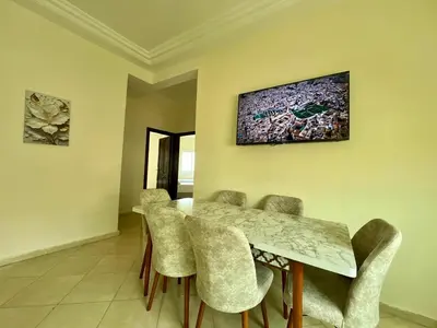 a dining room with a table and chairs at Appart Hotel Fes - Joud Families & Travelers in Fès