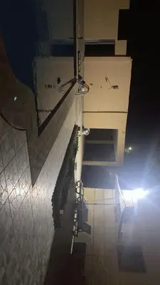 a view of a staircase in a building at night at Villa appartement jardin et piscine in Meknès
