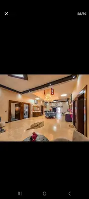 a large room with a living room and a kitchen at Zaouiet ben sassi in Marrakech