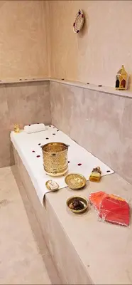 a table with bowls and plates on top of it at Villa Piscine Sans Vis à Vis in Marrakech