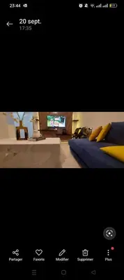 a picture of a room with a bed and a tv at Mamoune benz in Fès