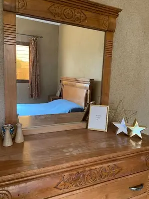a dresser with a mirror and stars on top of it at Séjour Authentique à Marrakech in Marrakech