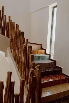 a row of wooden stairs in a building at Villa de luxe in Marrakech