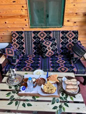 a table with a tray of food on it at Tikida house in Ouzoud