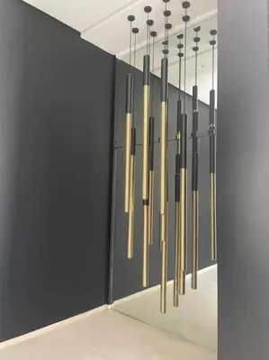 a row of baseball bats hanging from a wall at Villa M avec Piscine Chauffée in Marrakech