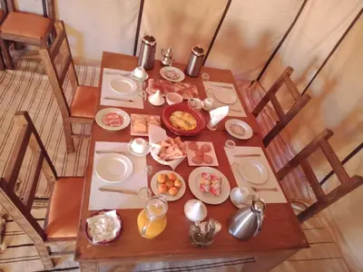 an overhead view of a table with food on it at Merzouga Luxury Camp & Activities in Merzouga