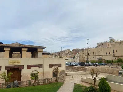a building in the middle of a city at Dar Lalla Yedouna Chez Charifa in Fès