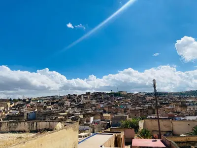 a view of a city from the top of a building at Dar Lalla Yedouna Chez Charifa in Fès