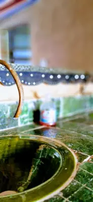 a close up of a sink with water at Ali Baba Desert Camp in El Gouera