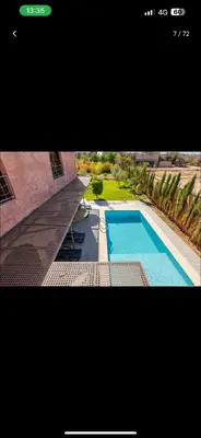 a picture of a swimming pool in a house at Villa wafai in Srarhna