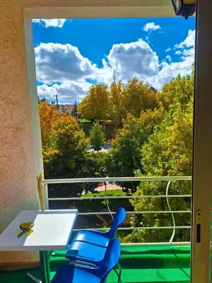 a room with a window with a table and chairs at Votre havre de paix à Ifrane in Ifrane
