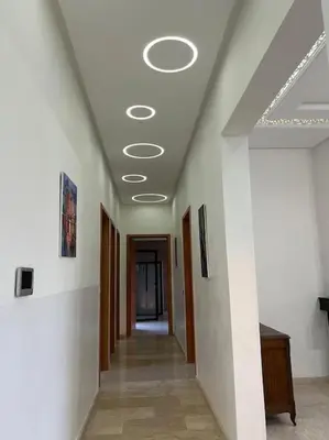 a hallway in a building with a ceiling at Elite Villa on the Road to Fes in Marrakech