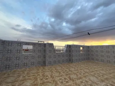 a rendering of a building with a wall at Modern suite BJ in Boujad