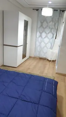a room with a refrigerator and a room with a floor at Welcome1 in Meknès