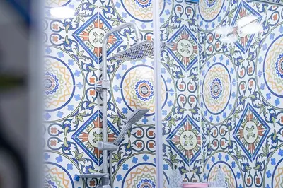 a blue and white tile wall with a bird on it at Dar Lmrama - Entire House in Fes in Fès