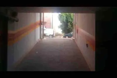 a view of a hallway with an open window at Top 4 Rooms Apartment in Beni Mellal