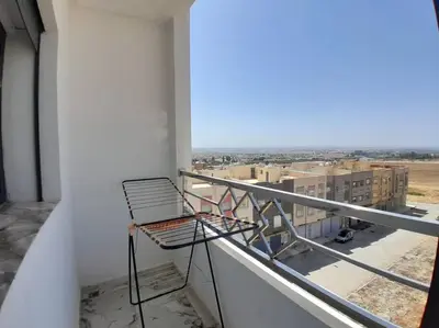 a balcony with a view of a city at Apartment Oued Fes close to Euromed in Fès