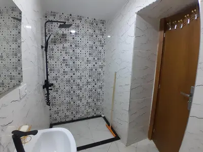 a bathroom with a shower and a sink in it at Apartment Oued Fes close to Euromed in Fès