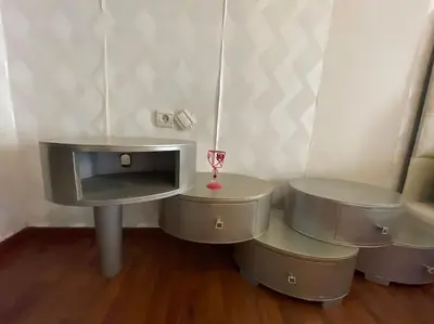 a room with a table with a wine glass on it at Appartement spacieux in Fès