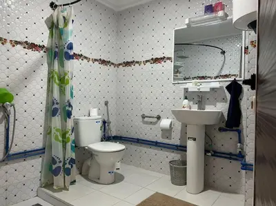 a bathroom with a toilet and a sink at Zen environnement Horse riding in Zaouia dʼIfrane