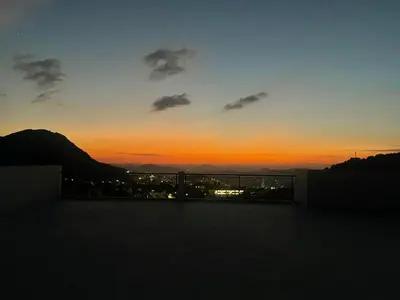 a sunset from the rooftop of a building at Studio Yasmine in Azrou
