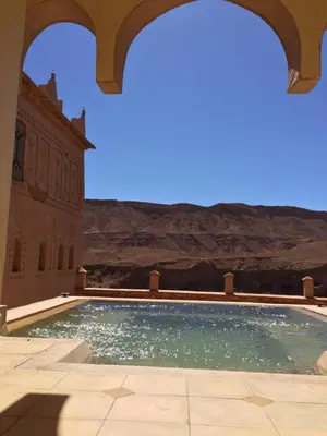a swimming pool with a view of the desert at Kasbah Titrit & Spa in Aït Ben Haddou