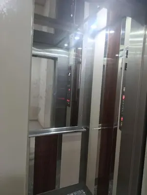 a glass door of a refrigerator in a room at iliy House in Mrhila